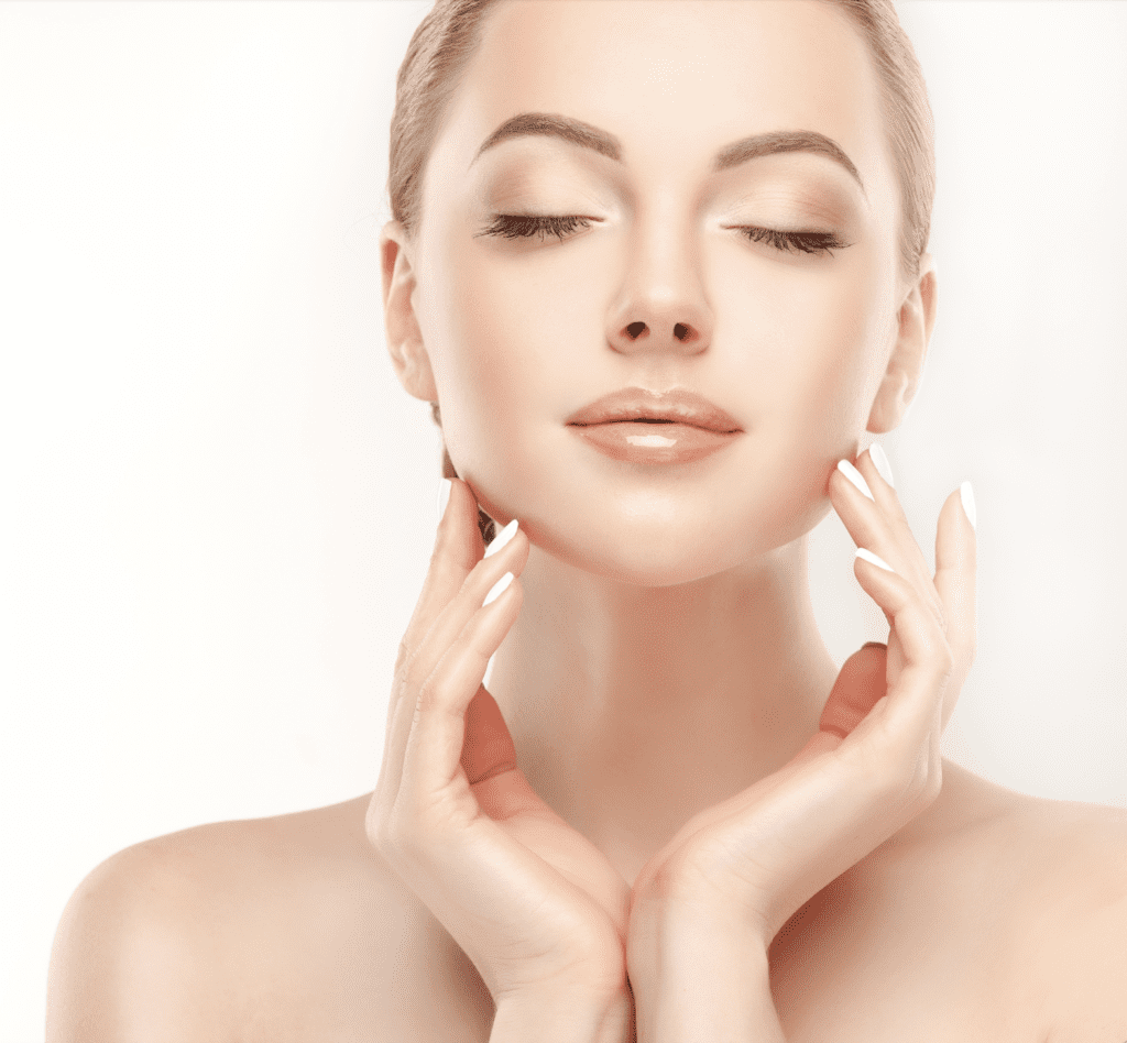 woman modeling skincare and makeup.