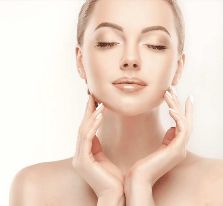 woman modeling skincare and makeup.