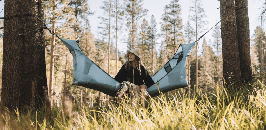A camper with her Haven tent.