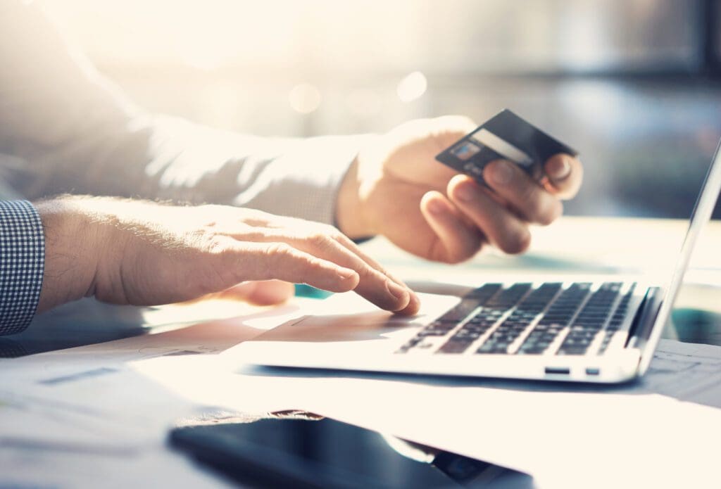 Transaction payment via laptop.