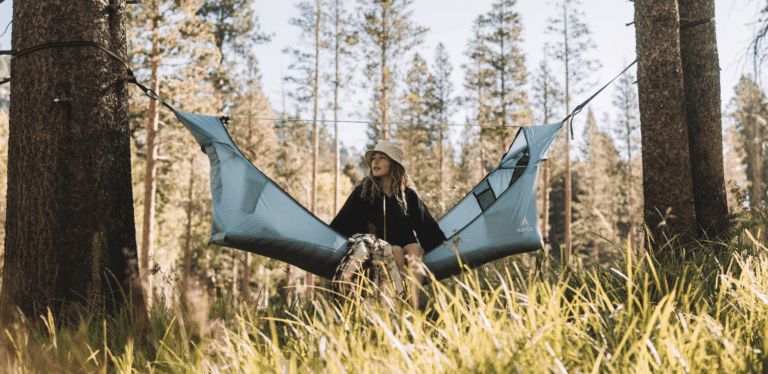 A camper with her Haven tent.